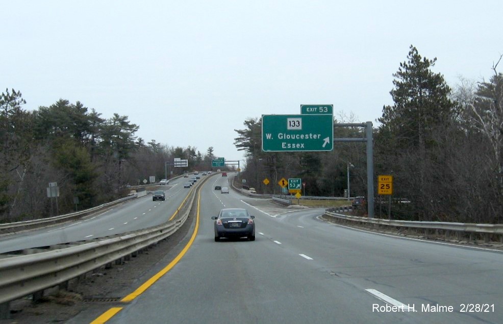 Image of overhead ramp sign for MA 133 exit with new milepost based exit number on MA 128 North in Gloucester, February 2021