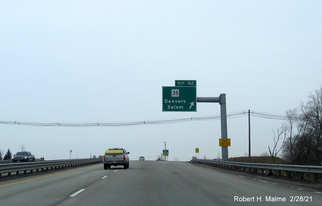 Image of overhead ramp sign for MA 35 exit with new milepost based exit number on MA 128 North in Danvers, February 2021