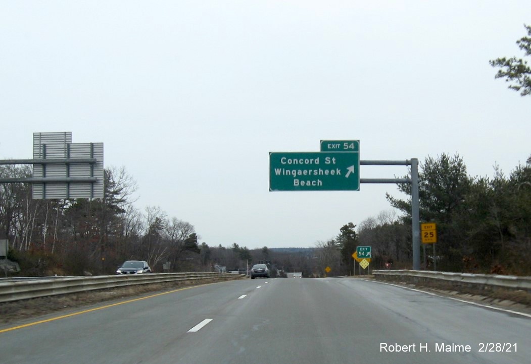 Image of overhead ramp sign for Concord Street exit with new milepost based exit number on MA 128 North in Gloucester, February 2021