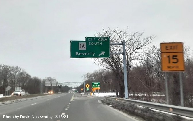 Image of overhead ramp sign for MA 1A South exit with new milepost based exit number on MA 128 South in Beverly, by David Noseworthy, February 2021