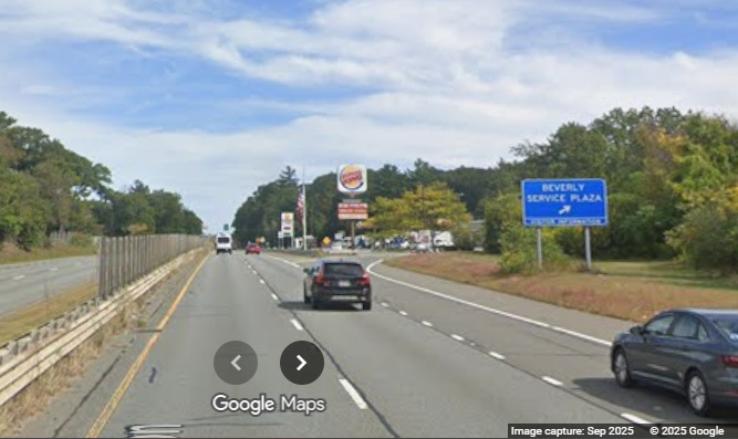 Image of new blue ramp sign for the Beverly Service Plaza on MA 128 North, 
	Google Maps Street View, September 2025