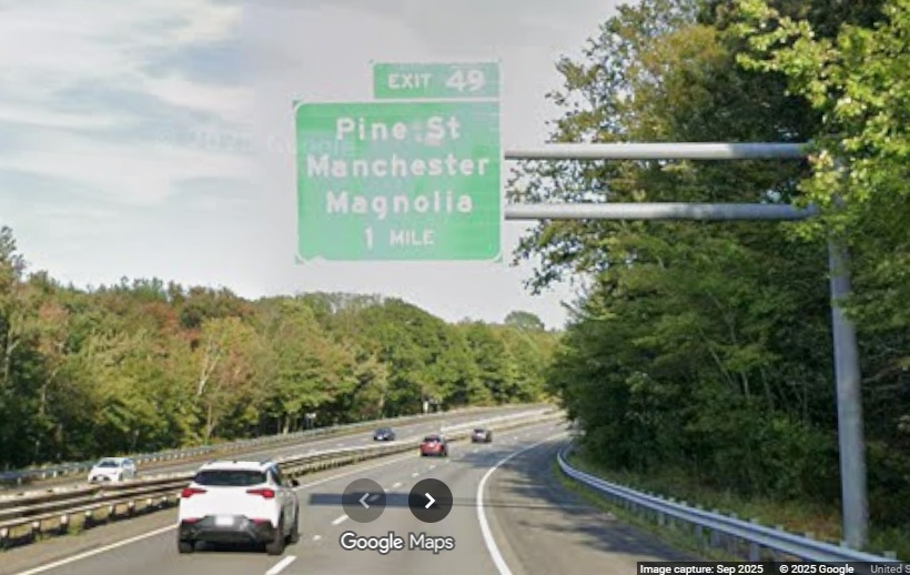 Image of new 1 mile advance overhead sign for Pine Street exit on MA 128 North in 
	Manchester-by-the-Sea, Google Maps Street View, September 2025
