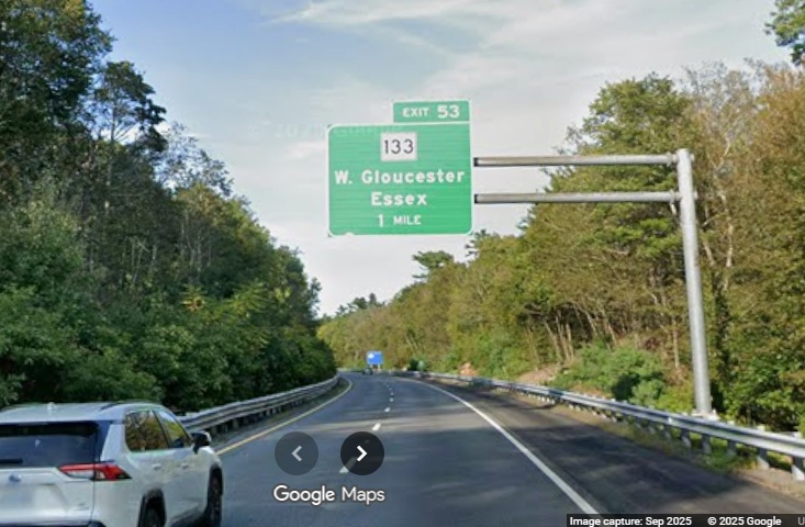 Image of new 1 Mile advance overhead sign for MA 133 exit on MA 128 North in 
	Gloucester, Google Maps Street View, September 2025