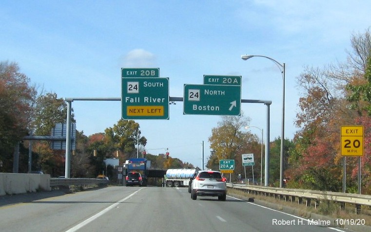 Image of overhead signs for MA 24 ramps with new milepost based exit numbers at end of MA 140 North freeway in Taunton, October 2020