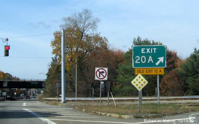 Image of gore sign at MA 24 North exit ramp with new milepost based exit number and yellow old exit tab below on MA 140 North in Taunton, October 2020