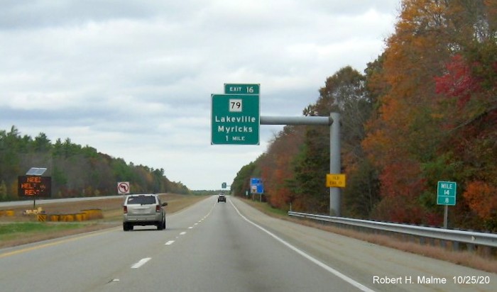 Image of 1-Mile advance sign for MA 79 exit with new milepost based exit number and yellow old exit number tab on support post on MA 140 North in Lakeville, October 2020