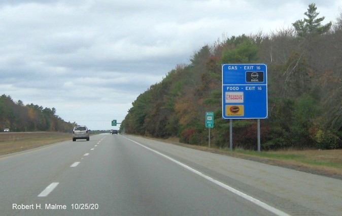 Image of ground mounted blue services auxiliary sign with new milepost based exit number for MA 79 exit on MA 140 North in Lakeville, October 2020
