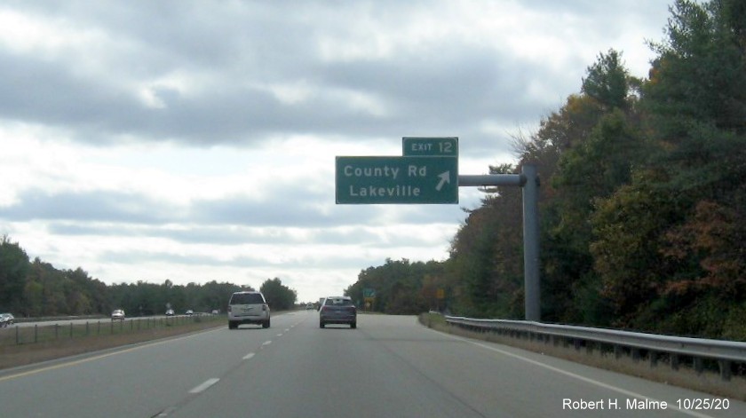 Image of overhead ramp sign for County Road exit with new milepost based exit number on MA 140 South in Lakeville, October 2020