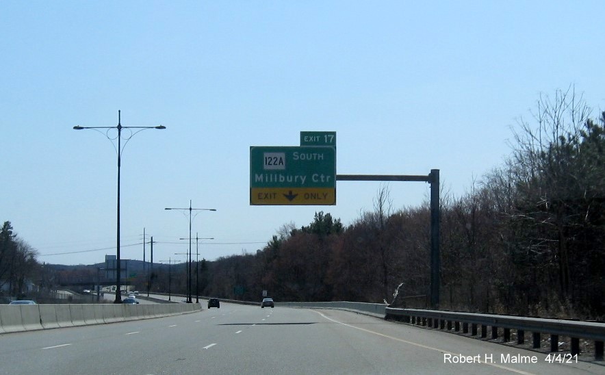 Image of 1/2 Mile advance exit only overhead sign for MA 122 South exit with new milepost based exit number on MA 146 South in Millbury, April 2021