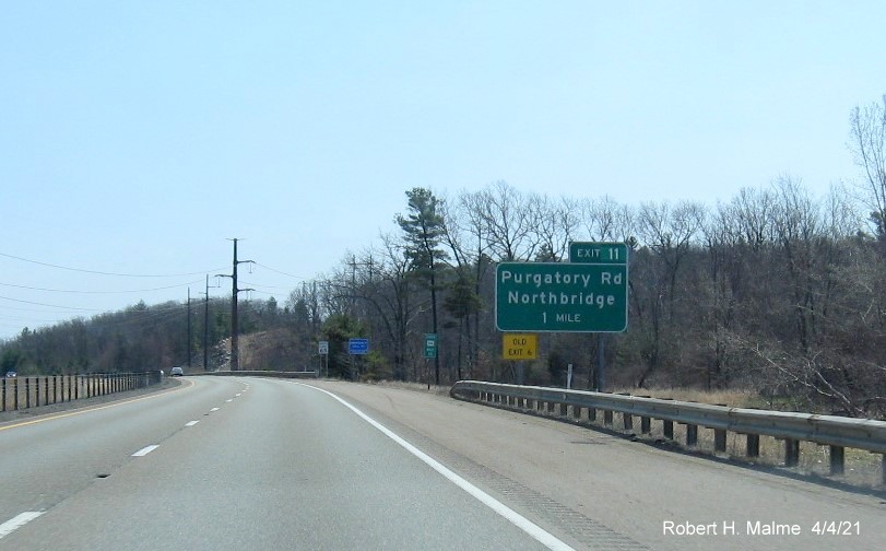 Image of 1 Mile advance sign for Purgatory Road exit with new milepost based exit number and yellow Old Exit 6 sign on left support on MA 146 South in Northbridge, April 2021