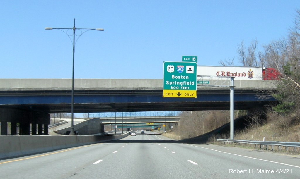 Image of overhead ramp sign for I-90/Mass Pike exit with new milepost based exit number on MA 146 North in Millbury, April 2021