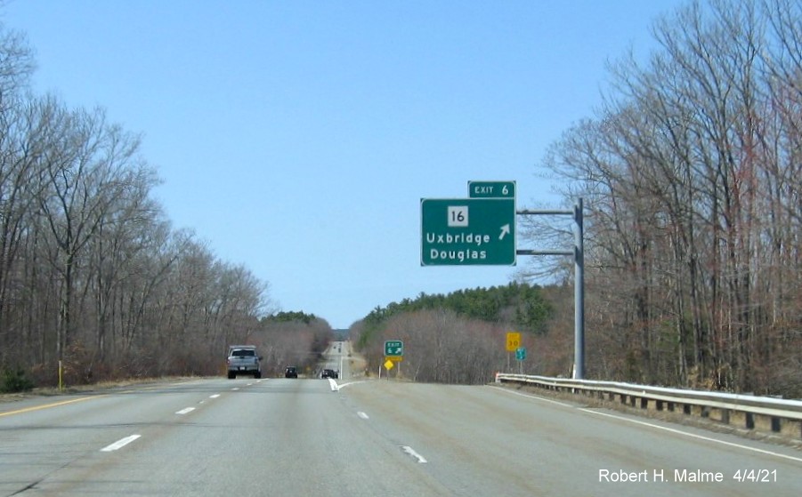 Image of overhead ramp sign for MA 16 exit with new milepost based exit number on MA 146 North in Uxbridge, April 2021
