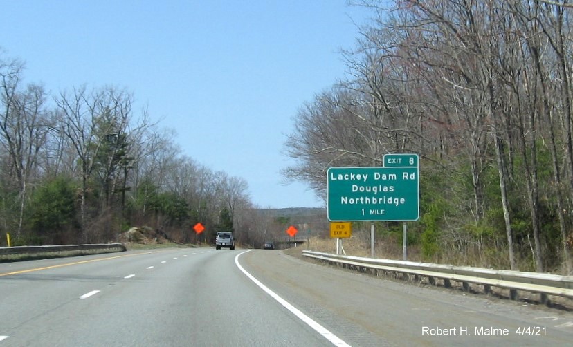Image of 1 mile advance sign for Lackey Dam Road exit with new milepost based exit number and yellow Old Exit 4 advisory sign on left support on MA 146 North in Douglas, April 2021