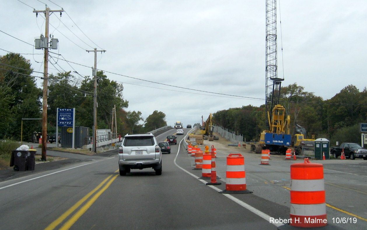 Image of commuter railroad bridge on MA 18 under construction in widening project work zone in South Weymouth