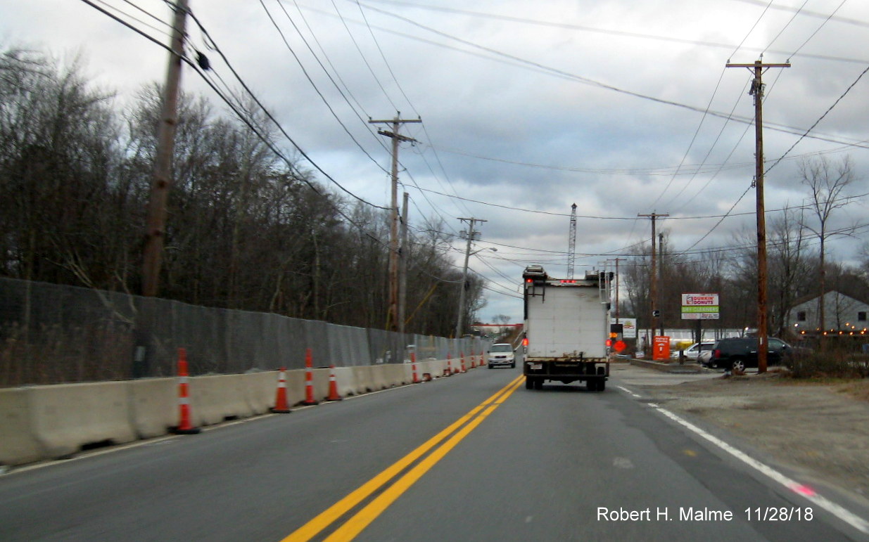 Image of concrete barrier for widening project as seen from MA 18 South heading toward commuter rail bridge in Weymouth