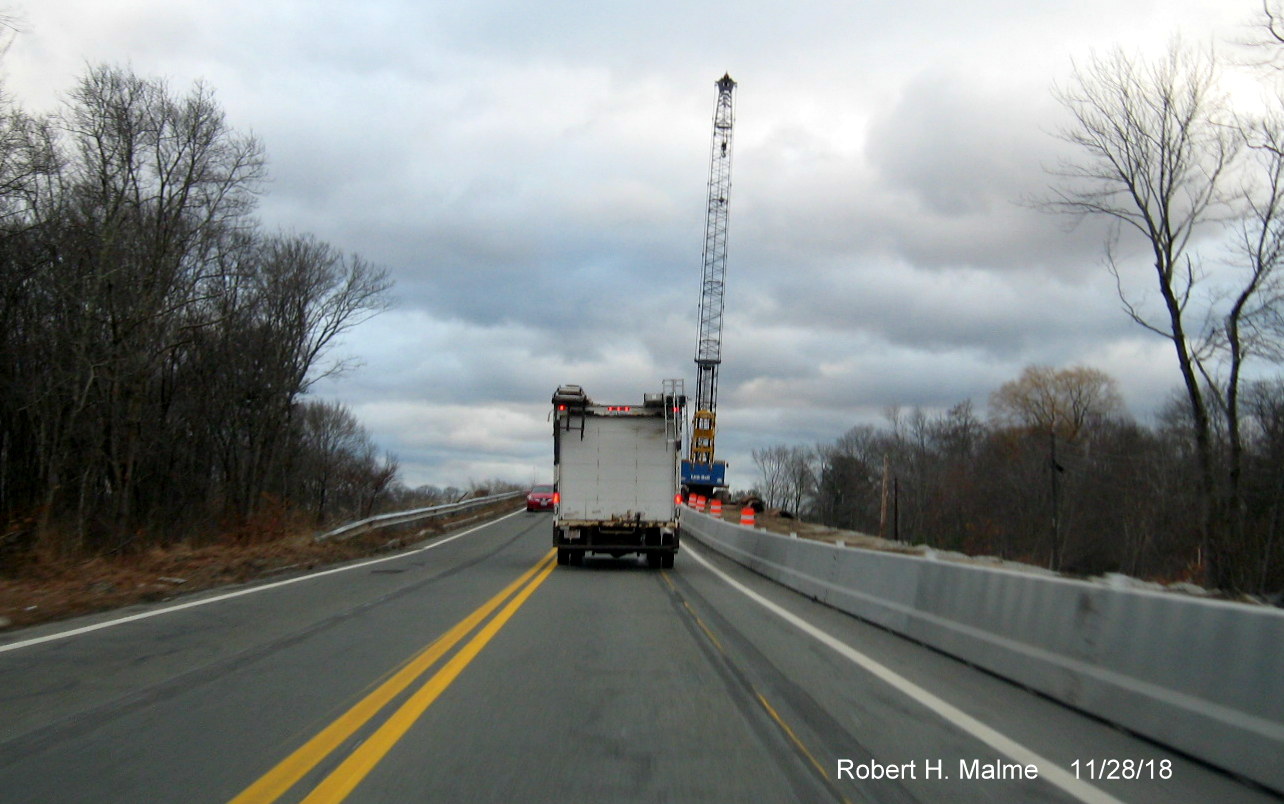Image of new traffic pattern on MA 18 commuter rail bridge with northbound traffic using former shoulder in widening project work zone in Weymouth