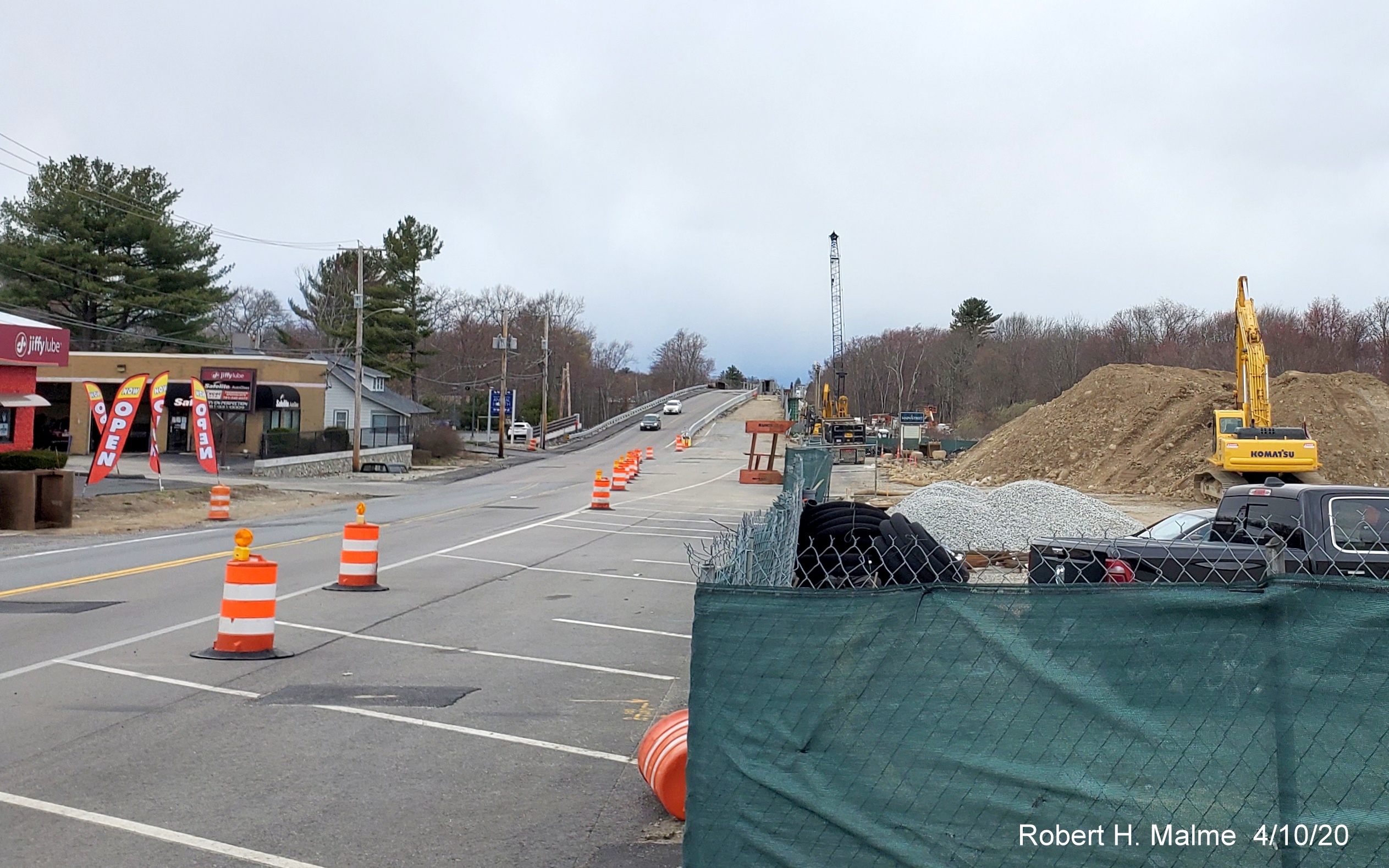 Image of commuter railroad bridge along MA 18 under construction as part of widening project in South Weymouth, taken in April 2020