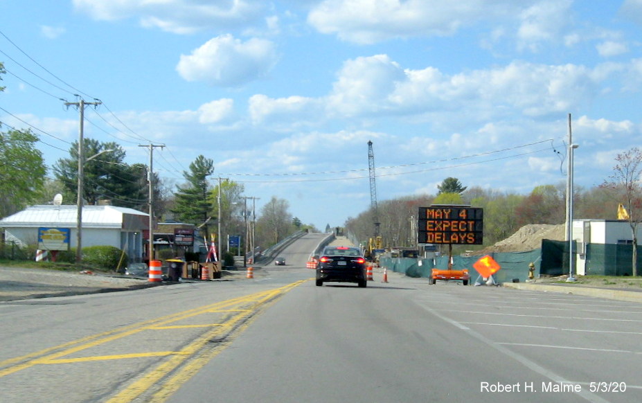 Image of MA 18 North approaching commuter railroad bridge under construction as part of widening project in South Weymouth, May 2020