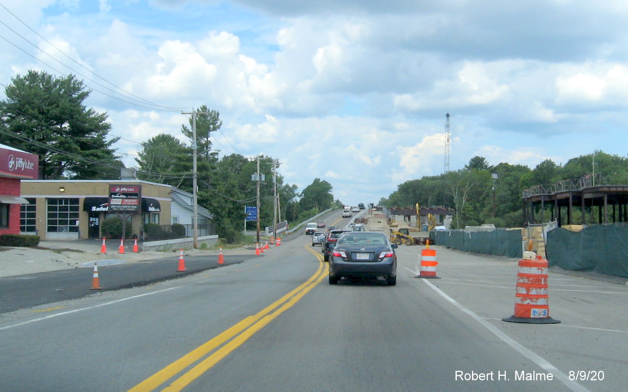 Image of newly paved future MA 18 south lane approaching commuter railroad bridge in South Weymouth, August 2020