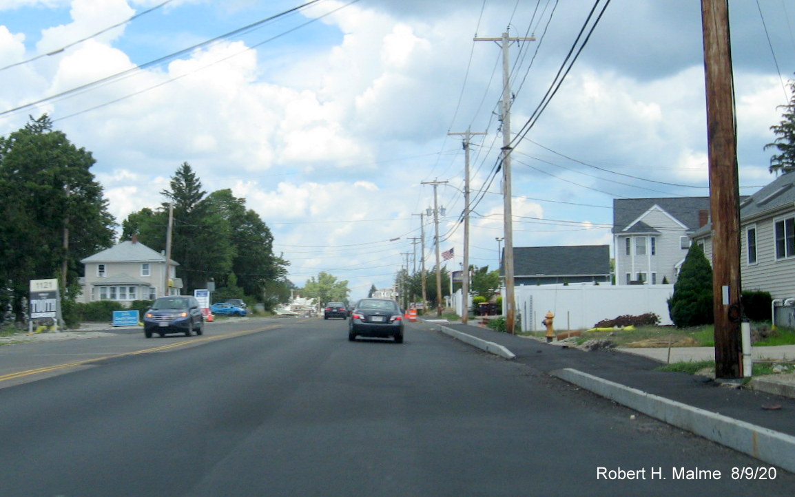 Image of new paved roadway and installed curbing after the intersection with Shea Blvd. on MA 18 North in widening project work zone in South Weymouth, August 2020