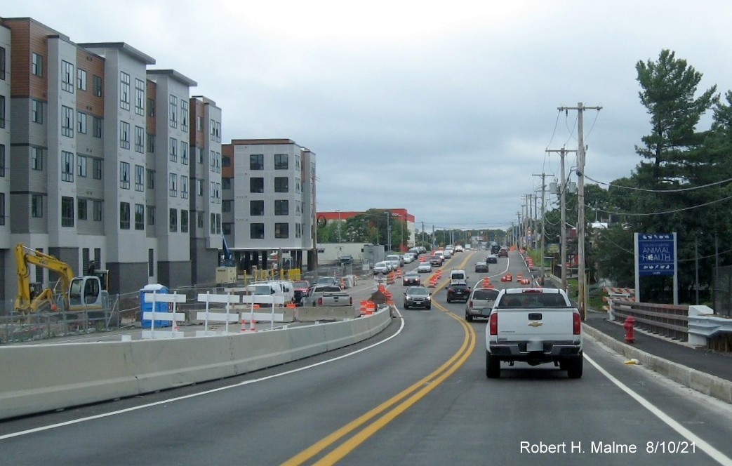 Image of traffic on MA 18 South after commuter railroad bridge still under construction in South Weymouth, August 2021