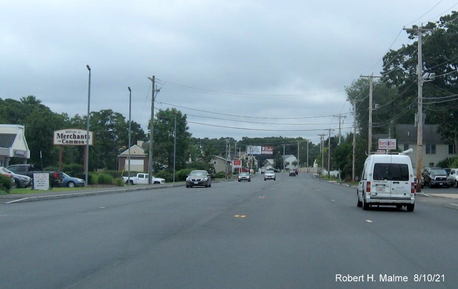 Image of traffic on MA 18 South along final paved lanes awaiting final striping in South Weymouth, August 2021