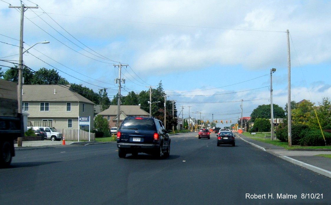 Image of traffic on MA 18 North at end of final paved lanes awaiting final striping prior to MA 58 intersection in South Weymouth, August 2021