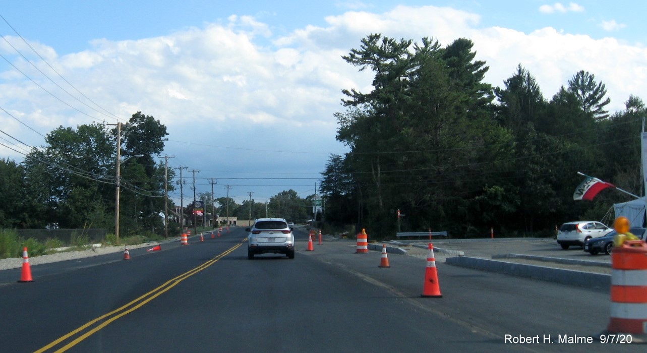 Image of MA 18 South in Abington showing new pavement and curbing installation in widening project work zone, September 2020
