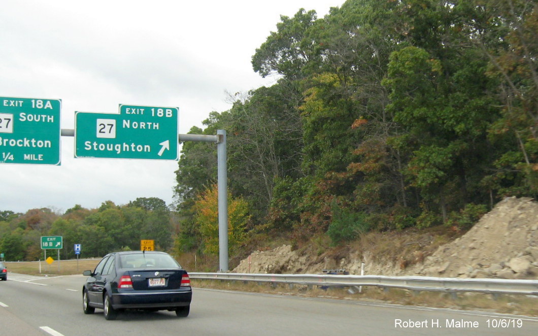 Image of new overhead sign support foundation in front of current sign at ramp to MA 27 South on MA 24 South in Brockton
