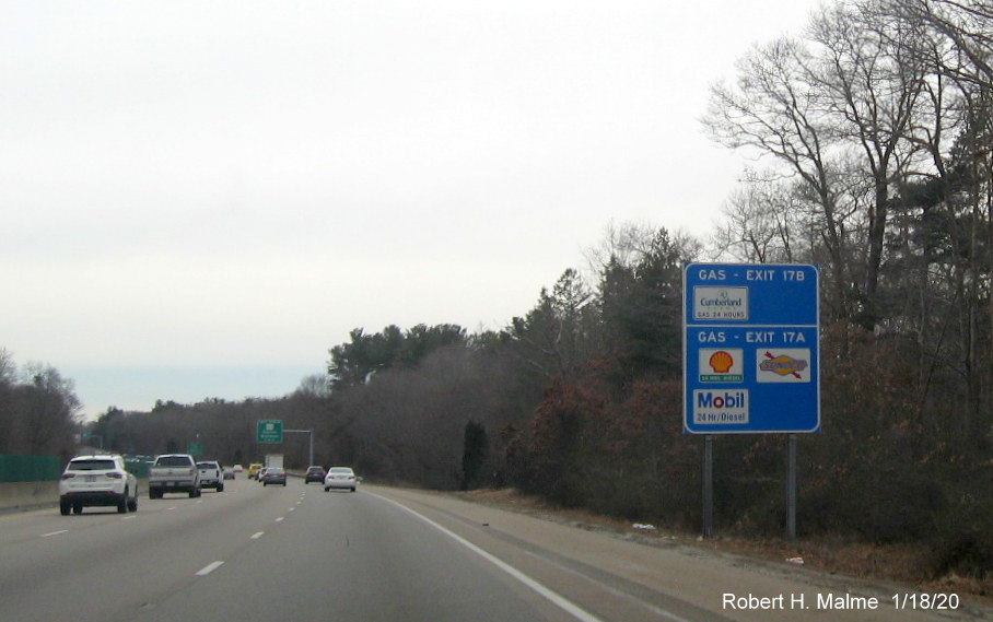 Image of recently placed blue services sign prior to MA 123 exit on MA 24 South in Brockton