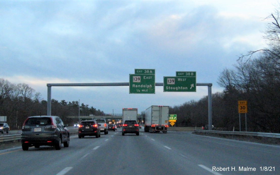 Image of overhead signs at MA 139 West exit ramp with new milepost based exit number on MA 24 South in Stoughton, January 2021