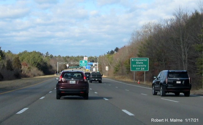 Image of auxiliary sign for MA 104 exit with new milepost based exit number on MA 24 North in Bridgewater, January 2021