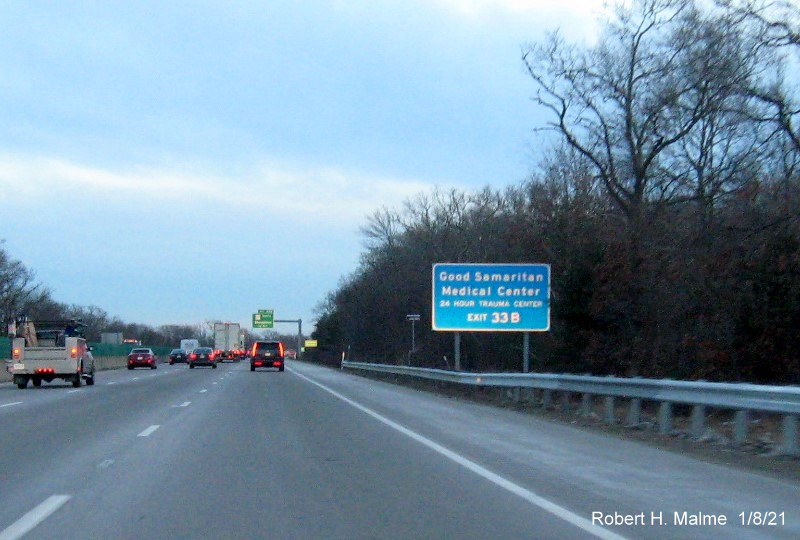 Image of hospital auxiliary sign for MA 27 North exit with new milepost based exit number 
                                       on MA 24 South in Brocktom, January 2021