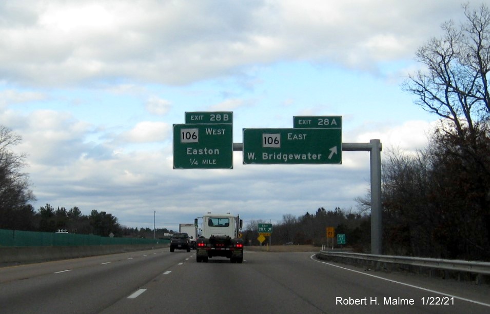 Image of overhead signs at ramp to MA 106 East exit with new milepost based exit numbers on MA 24 North in West Bridgewater, January 2021