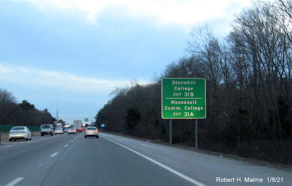 Image of auxiliary sign for MA 123 exits with new milepost based exit numbers 
                                      on MA 24 South in Brockton, January 2021