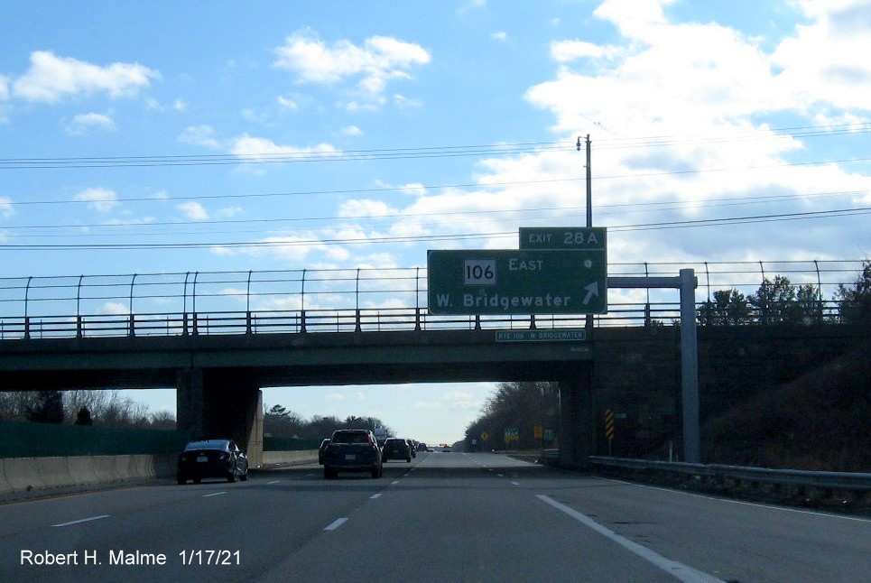 Image of overhead ramp sign for MA 106 East exit with new milepost based exit number on MA 24 South in West Bridgewater, January 2021