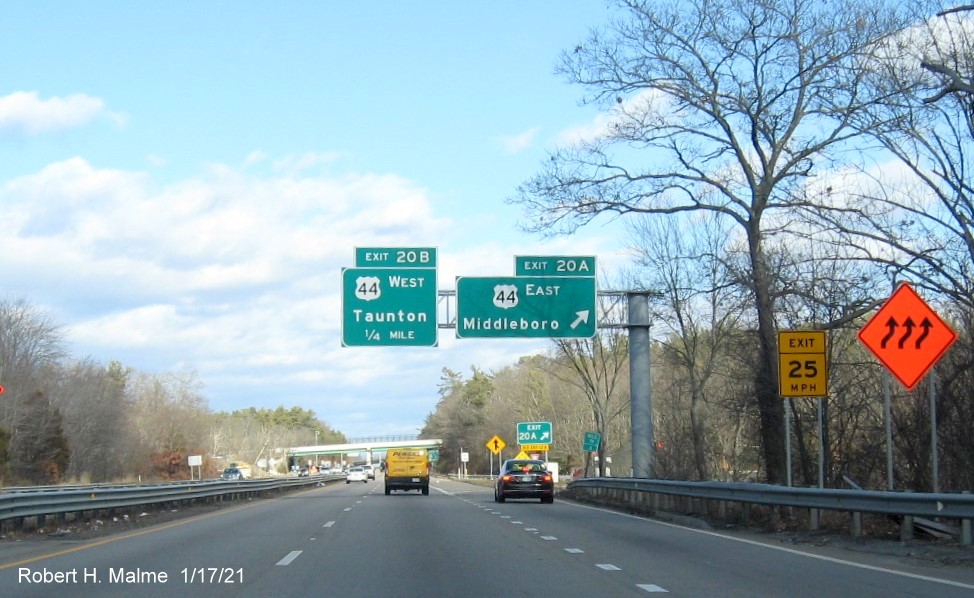 Image of overhead ramp signage at ramp to US 44 East exit with new milepost based exit number and gore sign with yellow Old Exits 13 B sign below on MA 24 North in Taunton, January 2021