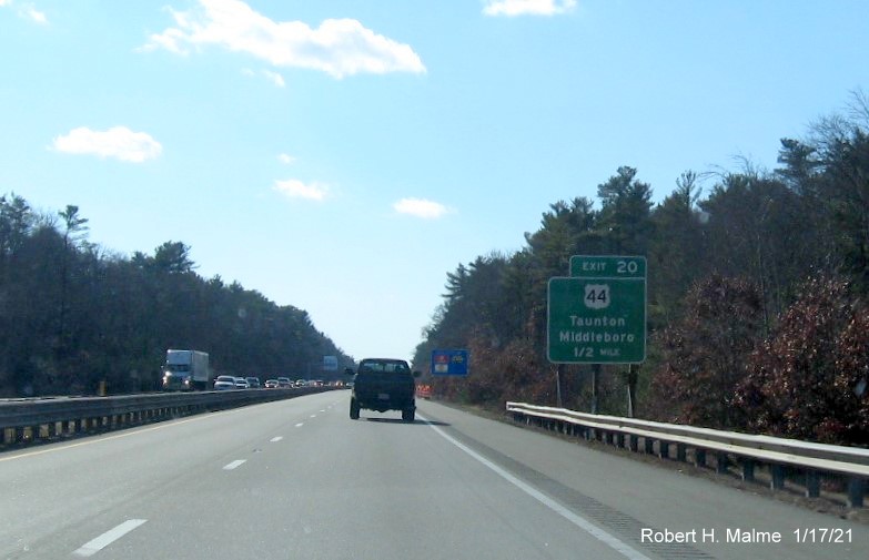 Image of 1/2 mile advance temporary ground mounted sign for US 44 exit with new milepost based exit number on MA 24 South in Raynham, January 2021