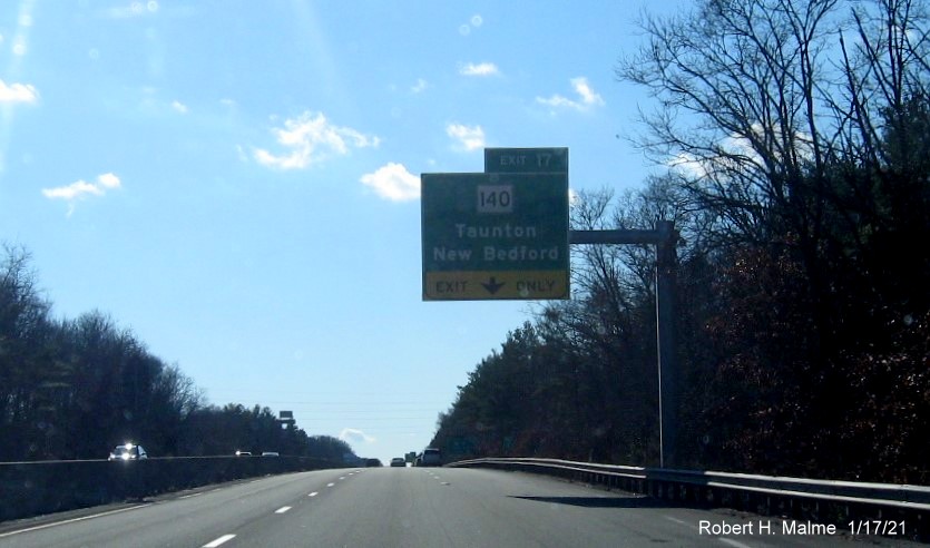 Image of 1/2 Mile advance overhead sign for MA 140 exit with new milepost based exit number on MA 24 South in Taunton, January 2021