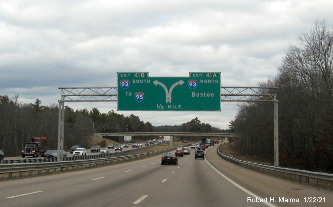 Image of 1/2 mile advance diagrammatic sign for I-93 exits with new milepost based exit numbers on MA 24 North in Randolph, January 2021