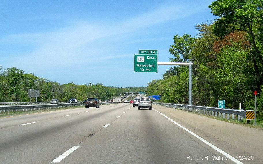 Image of recently placed 1/2 mile advance overhead sign for MA 139 East exit on MA 24 North in Stoughton