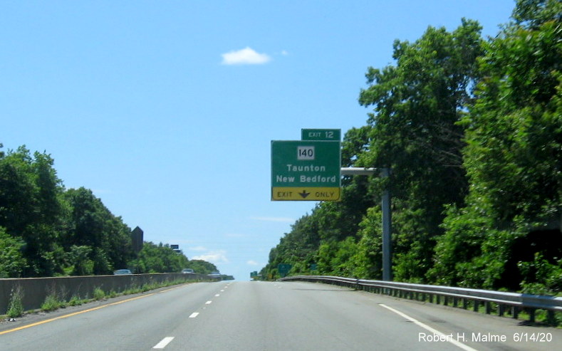 Image of recently placed 1/2 mile, exit only tab overhead exit sign for MA 140 exit on MA 24 South in Taunton, taken June 2020