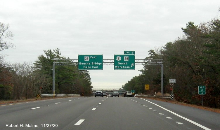 Image of overhead signs at ramp to US 6/MA 28 with new milepost based exit number on MA 25 East in Wareham, November 2020