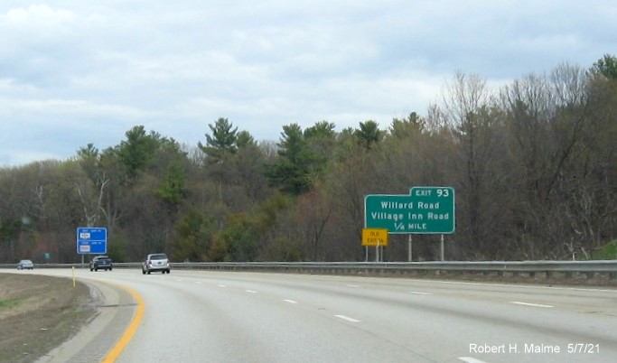 Image of 1/4 mile advance ground mounted sign for  Road exit with new milepost base exit number and yellow Old Exit 26 advisory sign on left support on MA 2 East in Fitchburg, May 2021