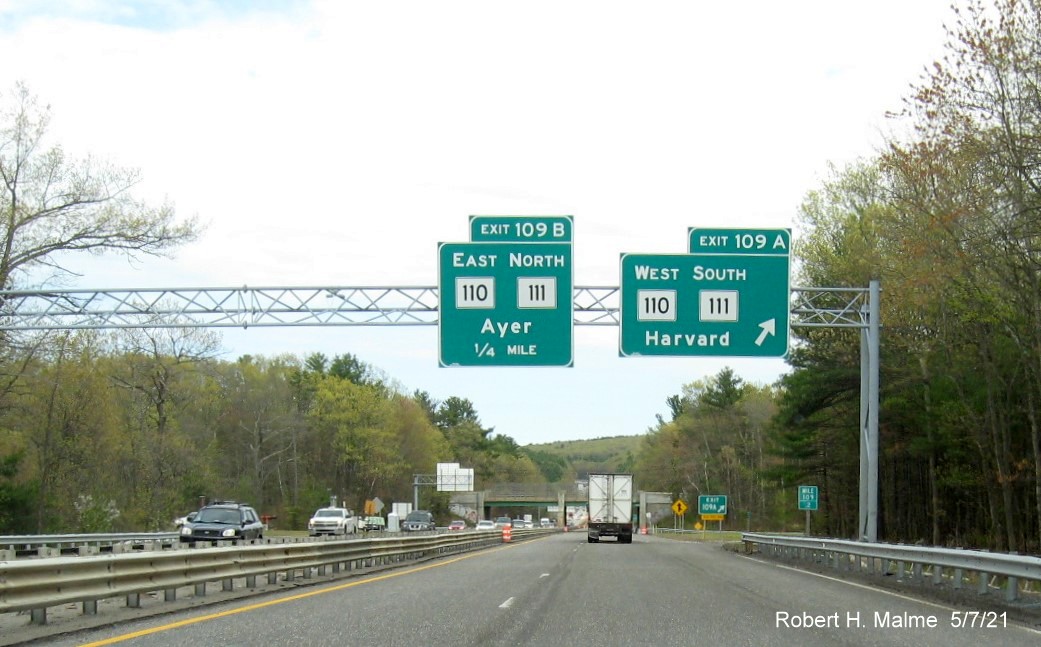 Image of overhead signage at ramp for MA 110 West/111 South exit with new milepost based exit numbers on MA 2 East in Harvard, May 2021
