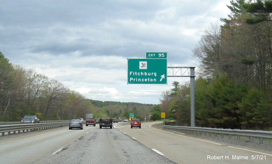 Image of overhead ramp sign for MA 31 exit with new milepost based exit number on MA 2 East in Fitchburg, May 2021