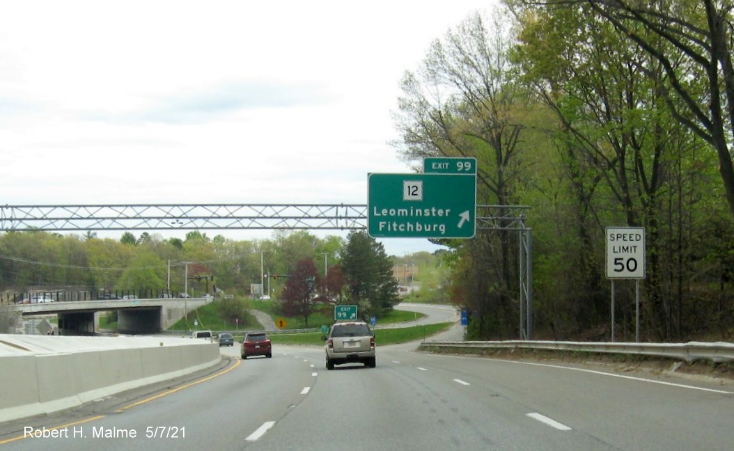 Image of overhead ramp sign for MA 12 exit with new milepost based exit number on MA 2 East in Leominster, May 2021