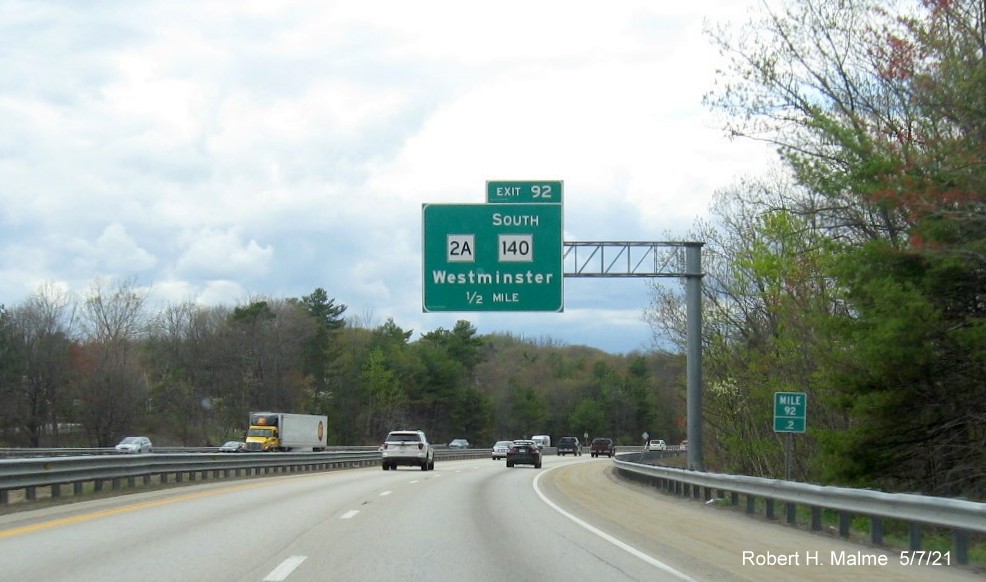 Image of overhead ramp sign for MA 2A/South MA 140 exit with new milepost based exit number on MA 2 West in Westminster, May 2021