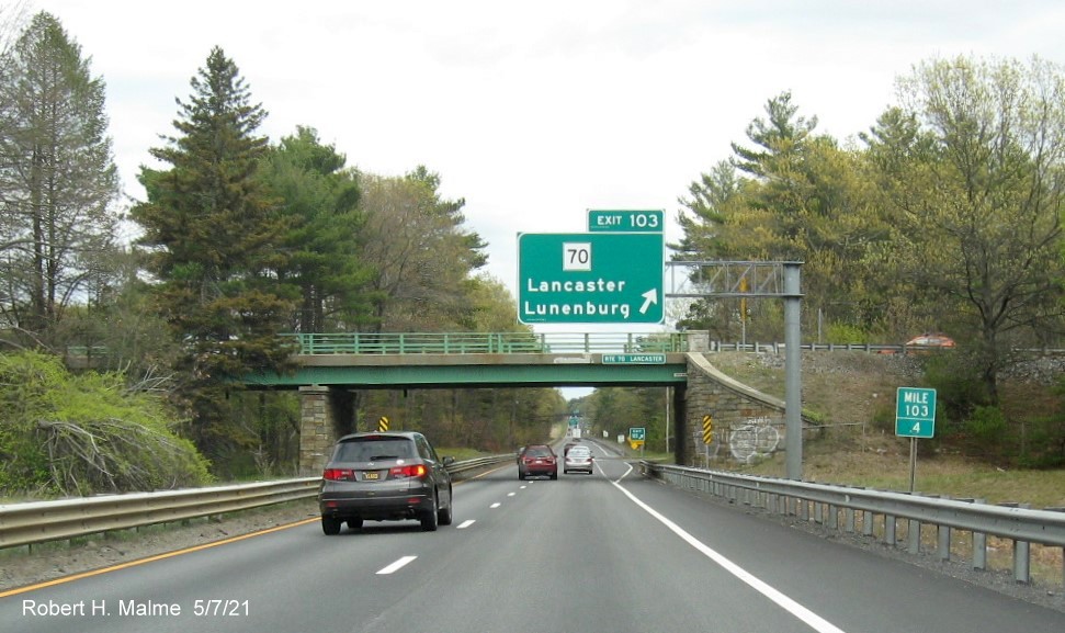 Image of overhead ramp sign for MA 70 exit with new milepost based exit number on MA 2 East in Lancaster, May 2021