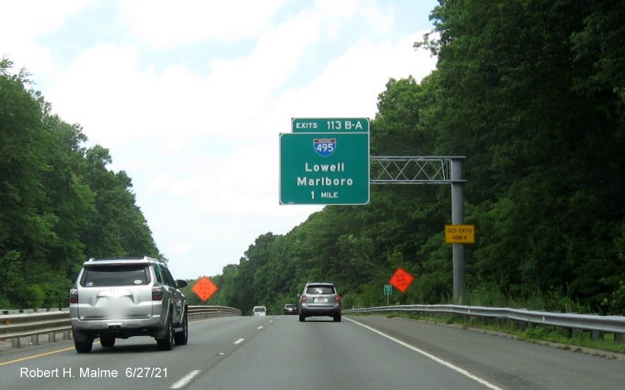 Image of 1 Mile advance sign for I-495 exits with new milepost based exit numbers and yellow Old Exit 40 advisory sign on support on MA 2 West in Littleton, June 2021